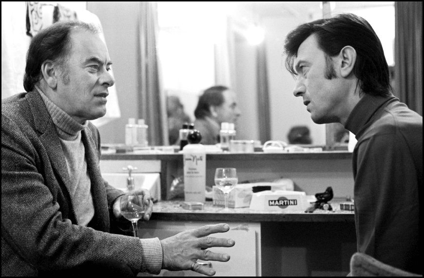 Actor John Ireland (1914 - 1992) visiting Laurence Harvey (1928 - 1973) backstage West End, London - 1971