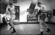 Heavyweight boxer Henry Cooper (R) with sparring partner Hampstead London - 1970